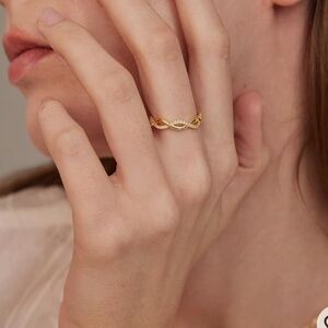 Moissanite eternity band. 14kt yellow gold plated size 7.